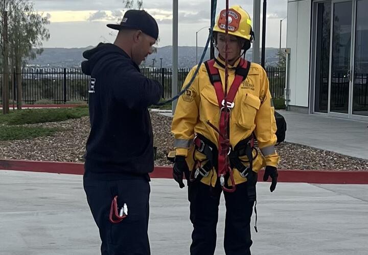Female firet cadet participates in training