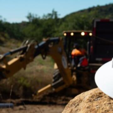 Work site with SDGE hard hat