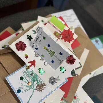Multiple holiday cards on the table
