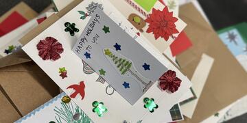 Multiple holiday cards on the table